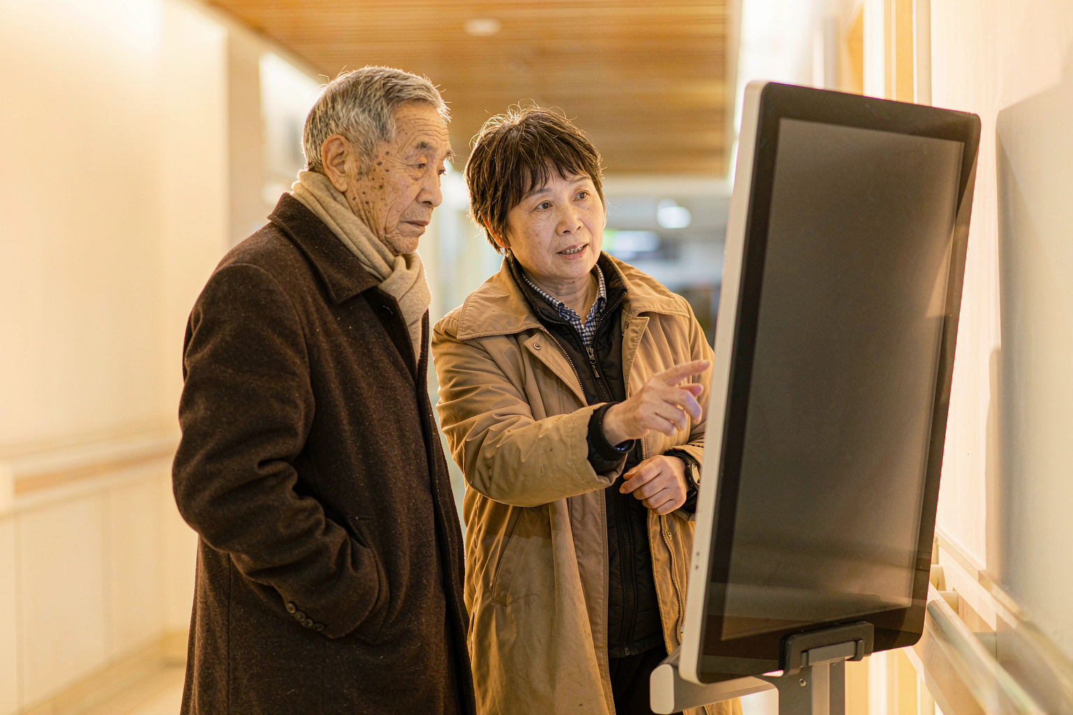 子女代约挂号 子女在手机上帮父母预约挂号
